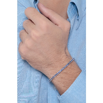 Tennis bracelet in 18k white gold with blue sapphires