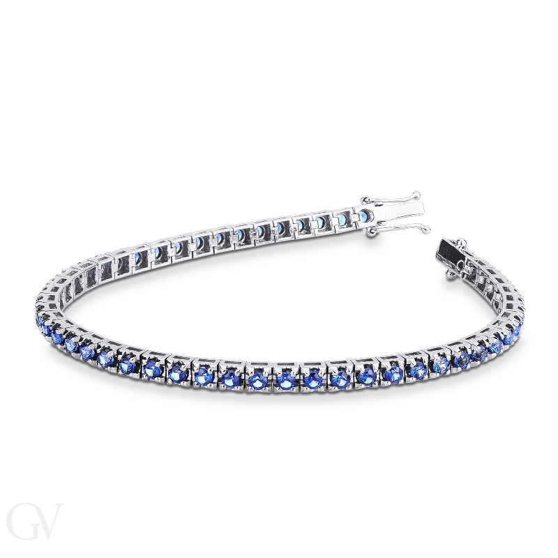 Tennis bracelet in 18k white gold with blue sapphires