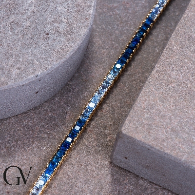 Fancy 18k yellow gold tennis bracelet with sapphire's blue shades