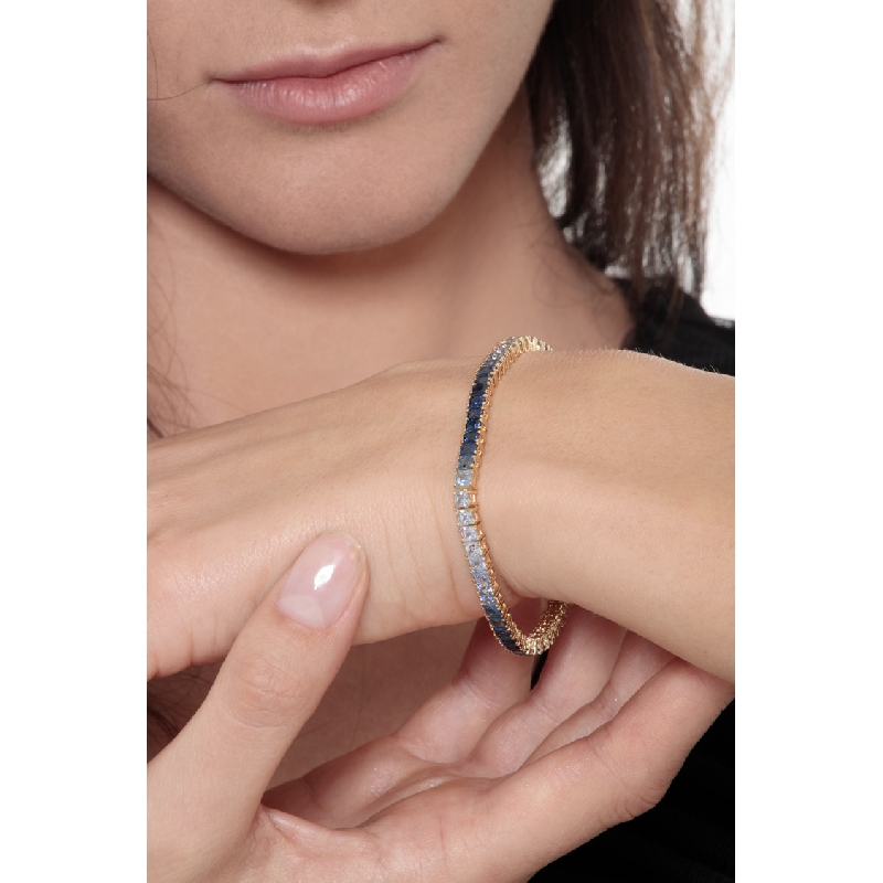Fancy 18k yellow gold tennis bracelet with sapphire's blue shades