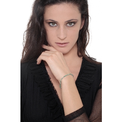 Square links tennis bracelet with round cut diamonds and emeralds