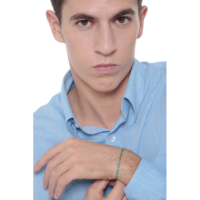 18k white gold tennis bracelet with round cut emeralds