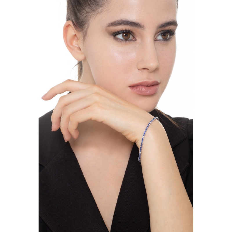 Bracciale Tennis in oro Bianco 18k con zaffiri blu intervallati da diamanti