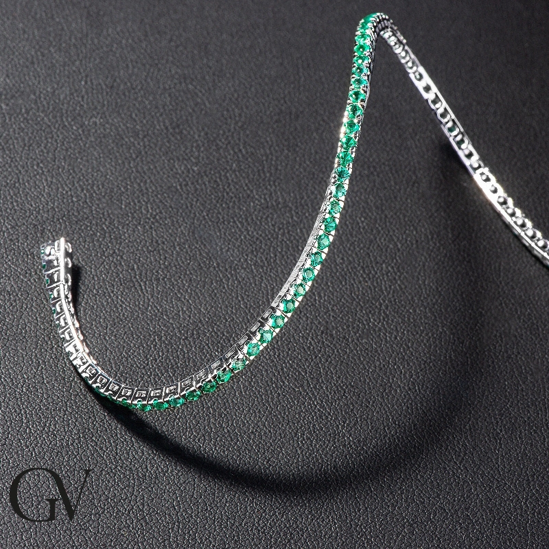 Emerald tennis bracelet in 18k white gold