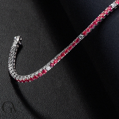 Square links tennis bracelet wih rubies and diamonds