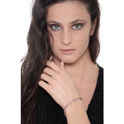 Square links tennis bracelet wih rubies and diamonds