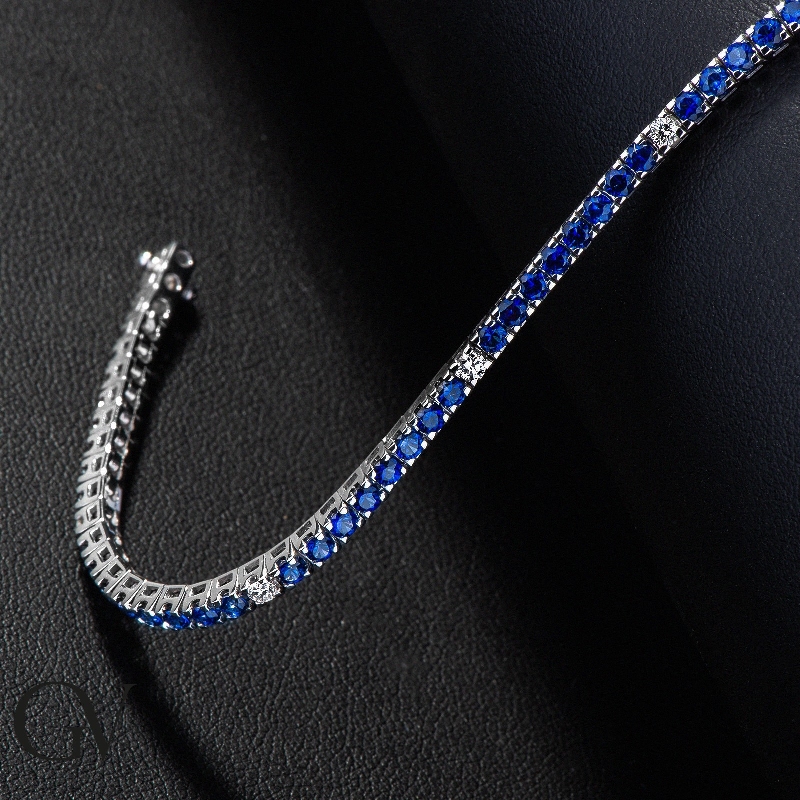 Square links tennis bracelet with diamonds and blue sapphires