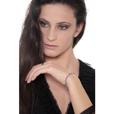 Square links tennis bracelet with diamonds and blue sapphires