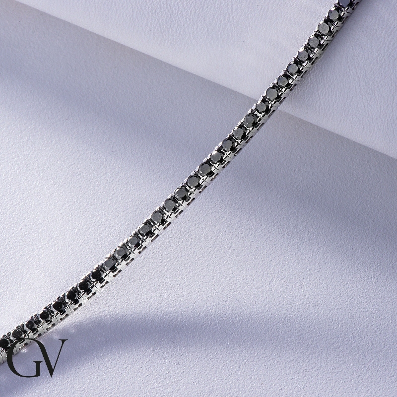 Tennis bracelet in 18k white gold with black diamonds