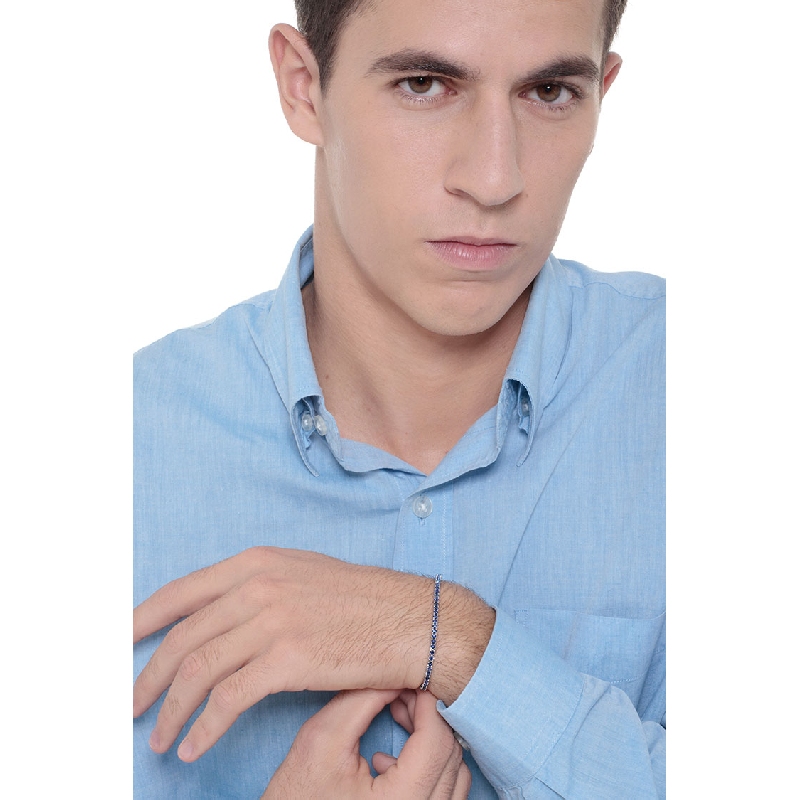 Wire style tennis bracelet with blue sapphires