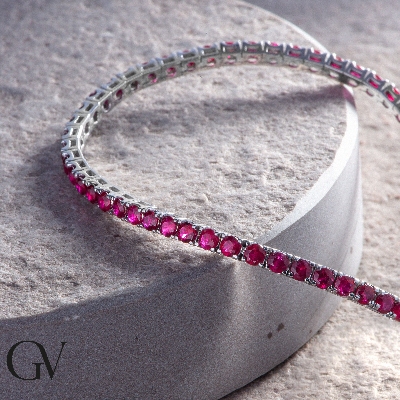 Ruby tennis bracelet in 18k white gold