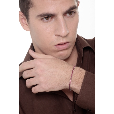 Ruby tennis bracelet in 18k white gold