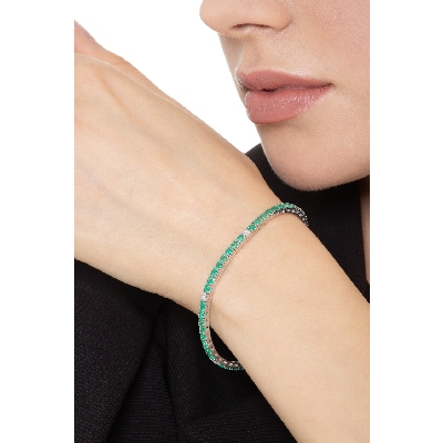 Tennis bracelet with emeralds and diamonds