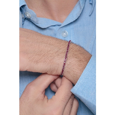 18k white gold tennis bracelet with round cut rubies