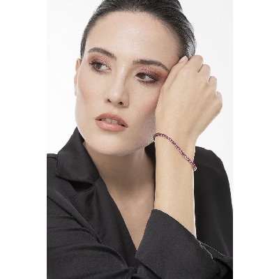 18k white gold tennis bracelet with round cut rubies