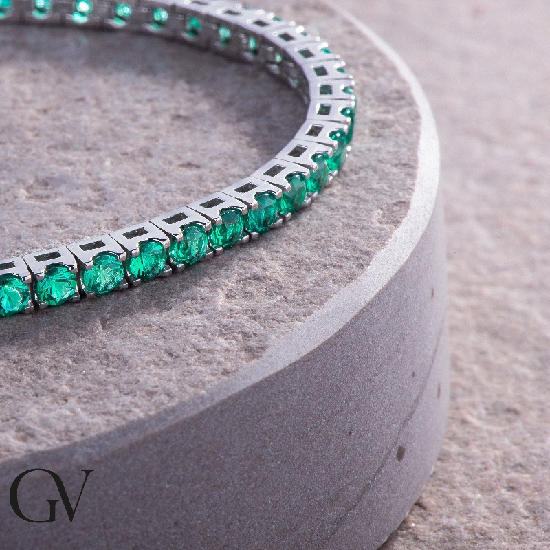 18k white gold tennis bracelet with emeralds 