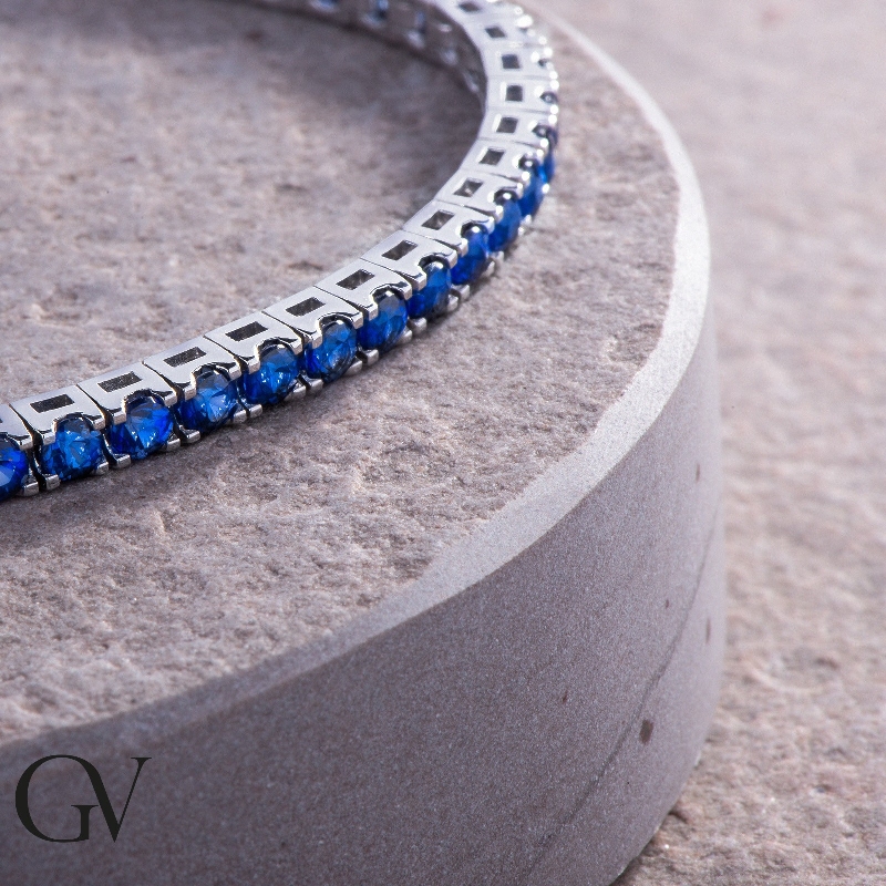 18k white gold tennis bracelet with blue sapphires
