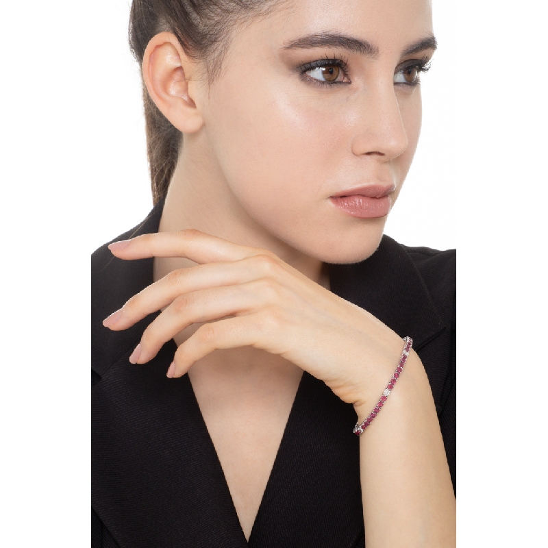 Tennis bracelet with rubies and diamonds