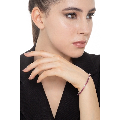 Tennis bracelet with rubies and diamonds