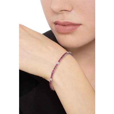 Tennis bracelet with rubies and diamonds