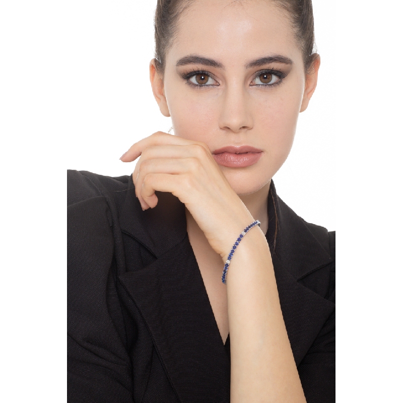 Tennis bracelet in white gold 18k with blue sapphire and diamonds