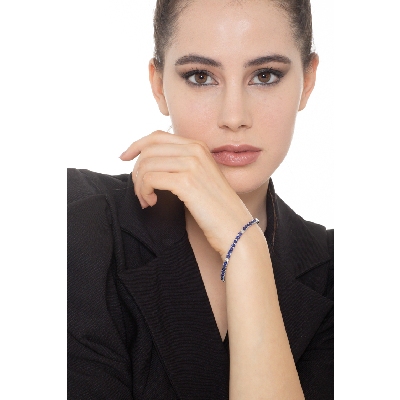 Tennis bracelet in white gold 18k with blue sapphire and diamonds