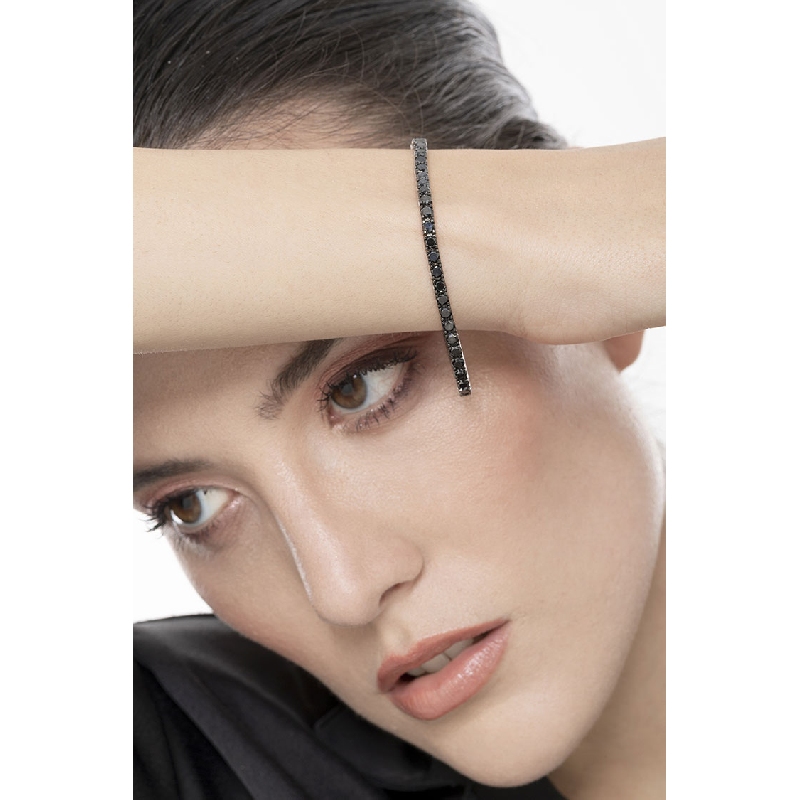 Bracciale Tennis lineare in oro Bianco 18k con diamanti neri e punte brunite
