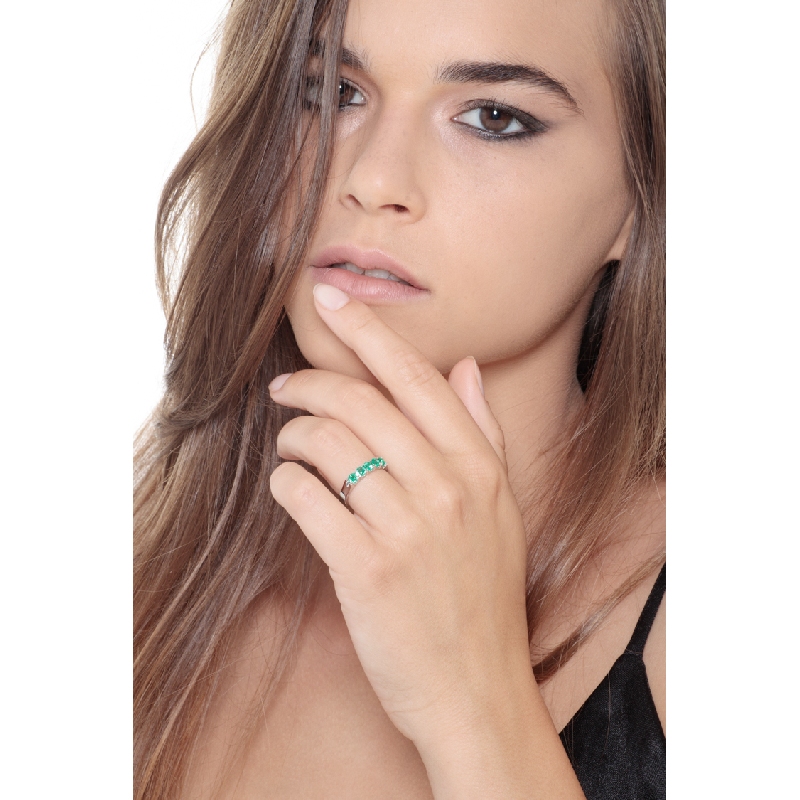 18k white gold half eternity ring with emeralds 
