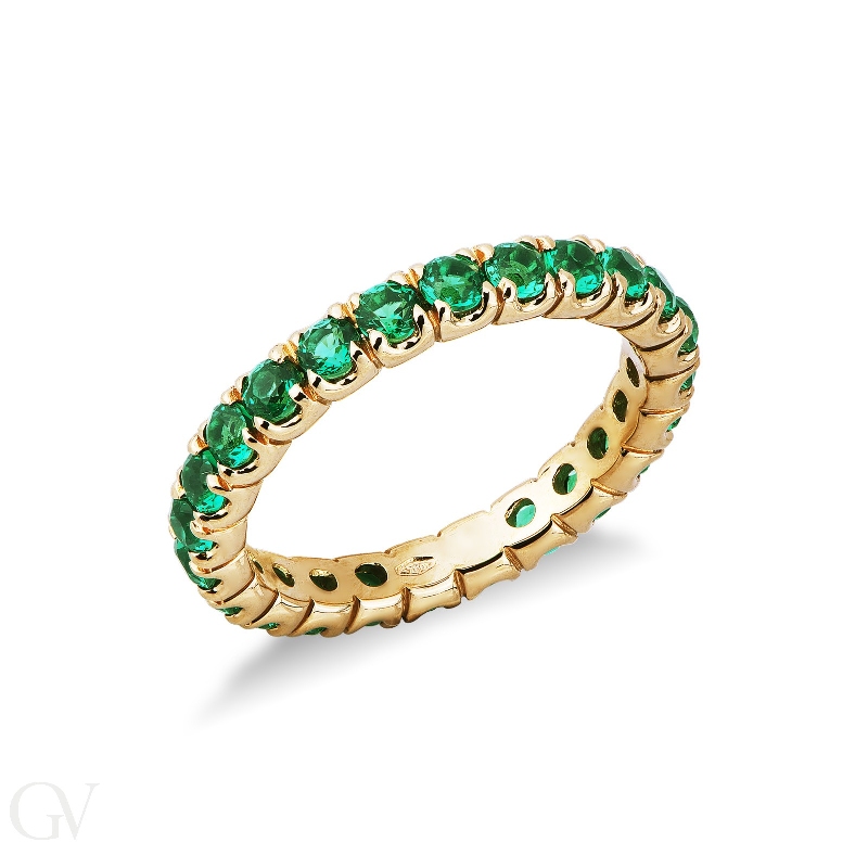 Yellow gold 18k eternity ring with emeralds