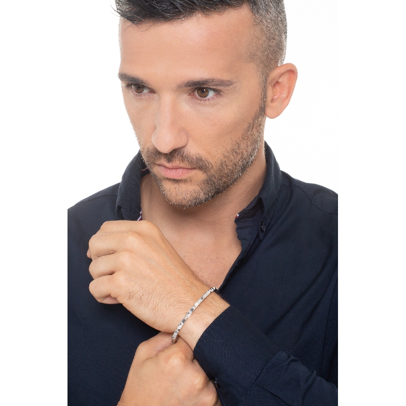 BRACCIALE RIGIDO CON BORCHIE MISURA UOMO(6,5CM X 5,5CM) CON BRILL