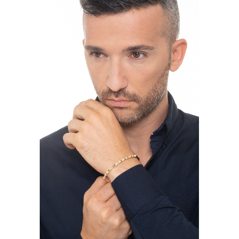 BRACCIALE RIGIDO CON BORCHIE MISURA UOMO(6,5CM X 5,5CM) CON BR NERI