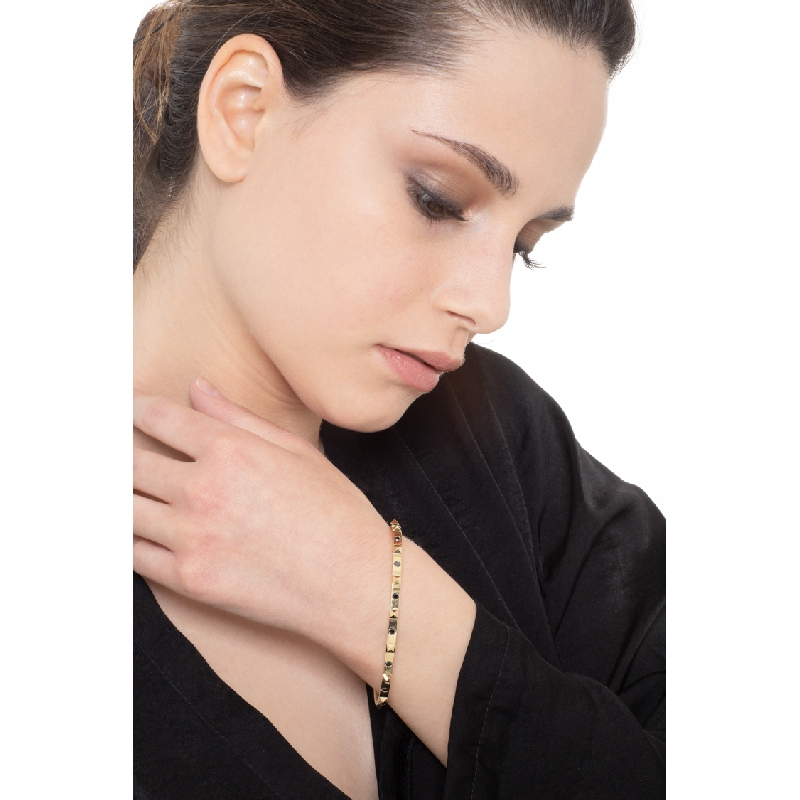 BRACCIALE RIGIDO CON BORCHIE MISURA DONNA (6CM X 5CM) CON BR NERI