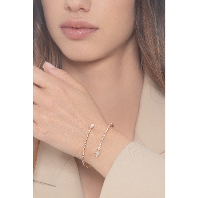 Bracciale semirigido in oro rosa 18k con gocce alle estremità e incastonati diamanti