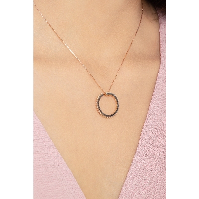 18k rose gold pendant with black and white diamonds circle pendant