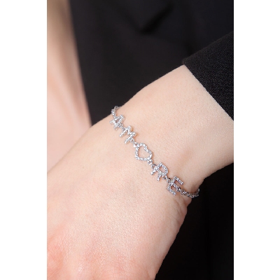 Bracciale con scritta personalizzabile in oro Bianco 18k e diamanti, AMORE