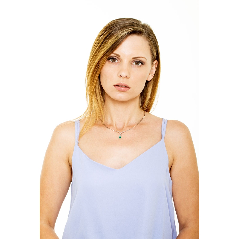 Fancy semirigid necklace with emerald and diamonds