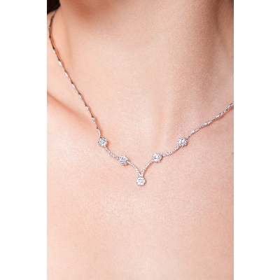Semirigid necklace with diamond flowers