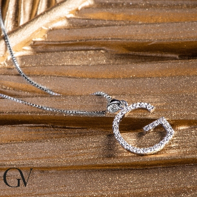 Letter G pendant with round cut diamonds
