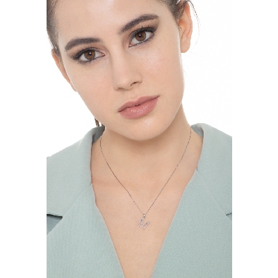 Letter M pendant with round cut diamonds