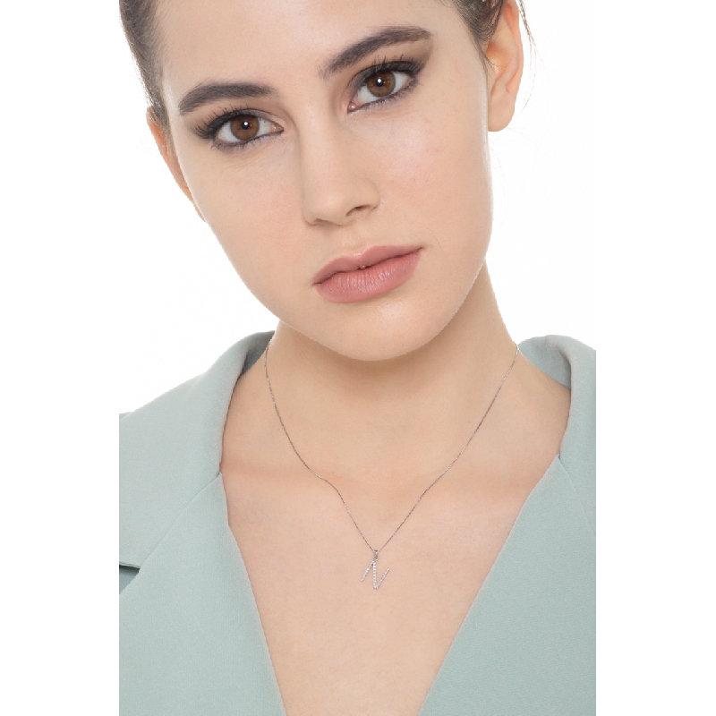 Letter N pendant with round cut diamonds