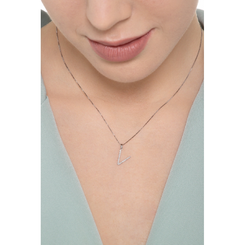Letter V pendant with round cut diamonds