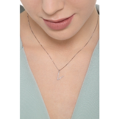 Letter V pendant with round cut diamonds