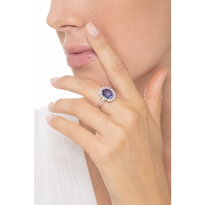 White gold 18k halo ring with tanzanite oval cut and diamonds  