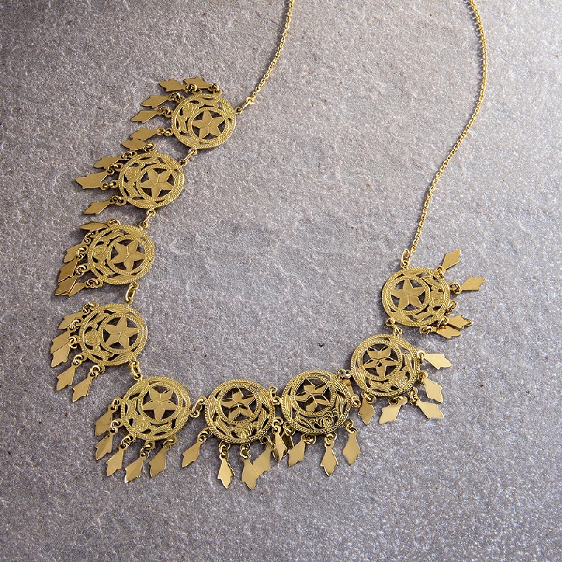 Ethnic necklace in 18k yellow gold