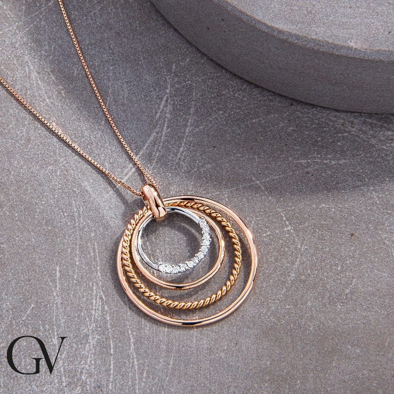 Fancy circles pendant in 18k white and rose gold