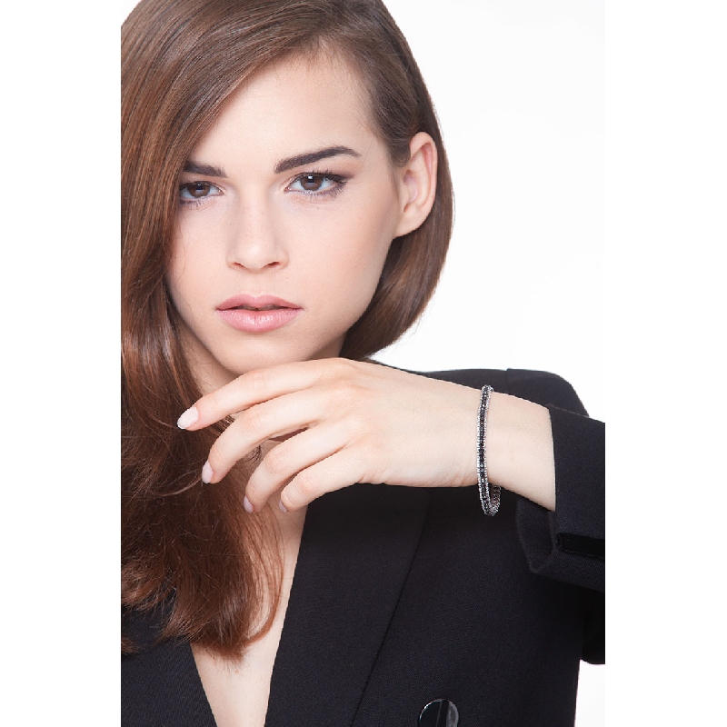 Fancy tennis bracelet in white gold 18k with black and white diamonds