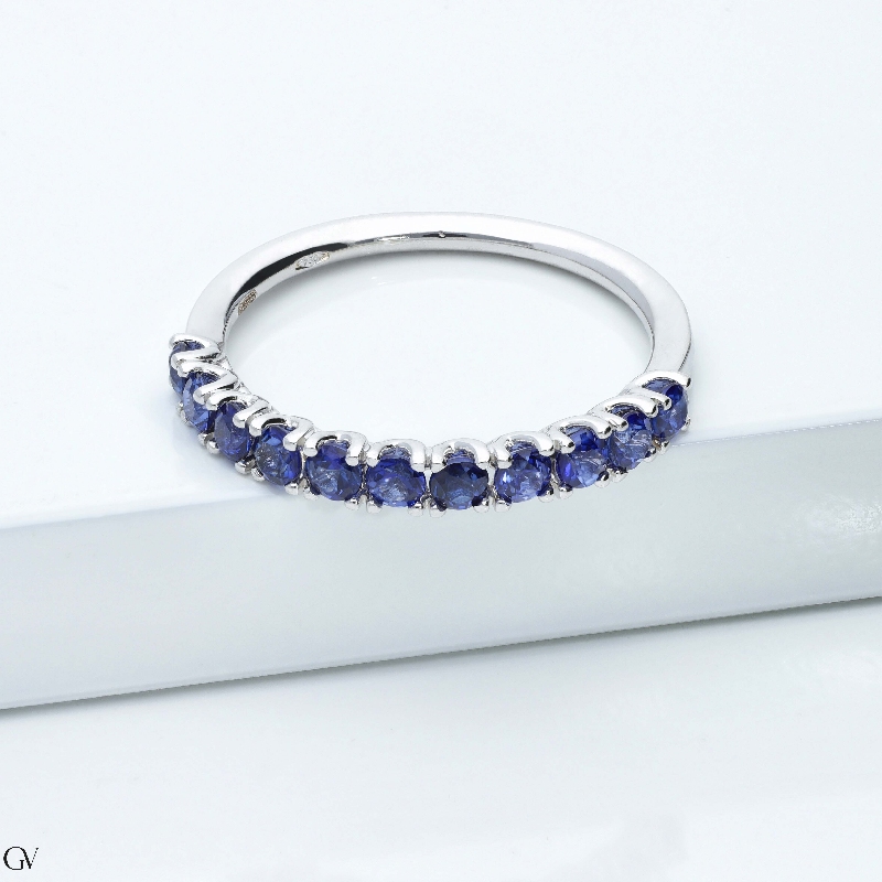 18k white gold half eternity ring with 11 blue sapphires