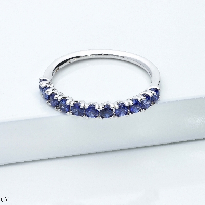 18k white gold half eternity ring with 11 blue sapphires
