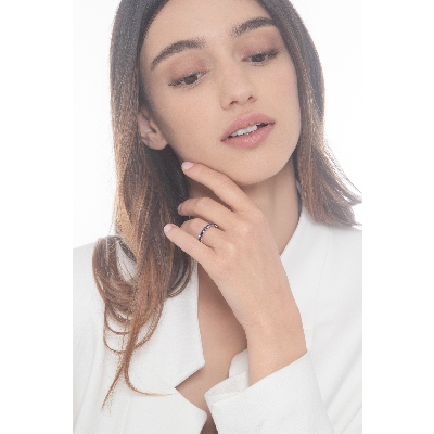 18k white gold half eternity ring with 11 blue sapphires