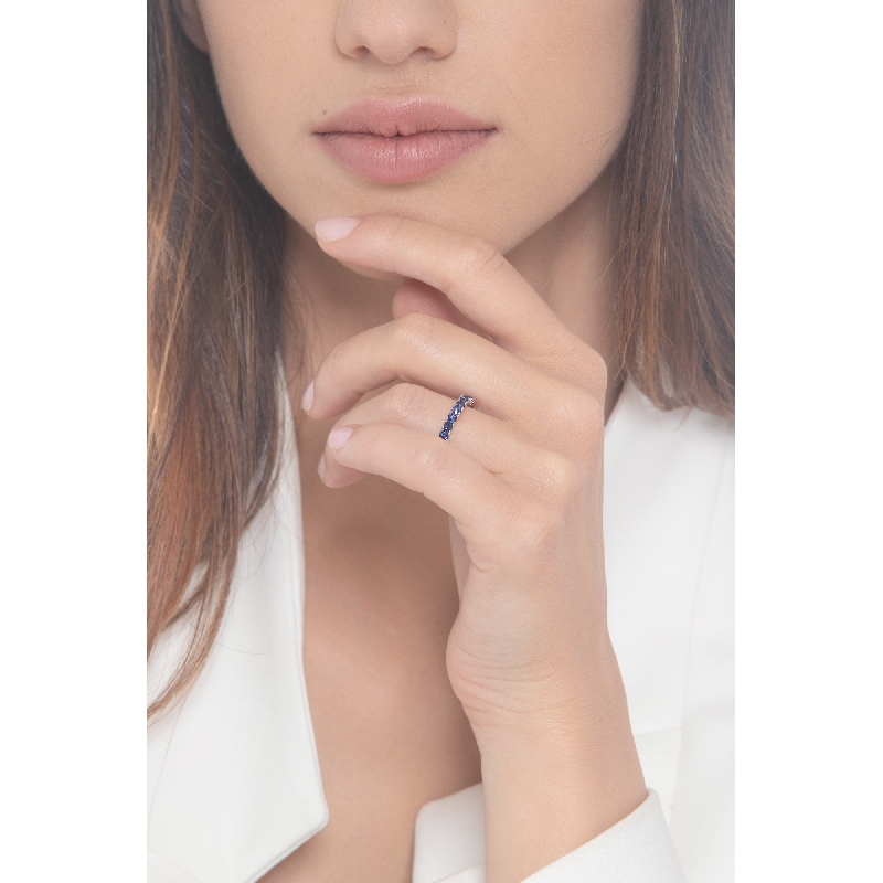 18k white gold half eternity ring with 11 blue sapphires